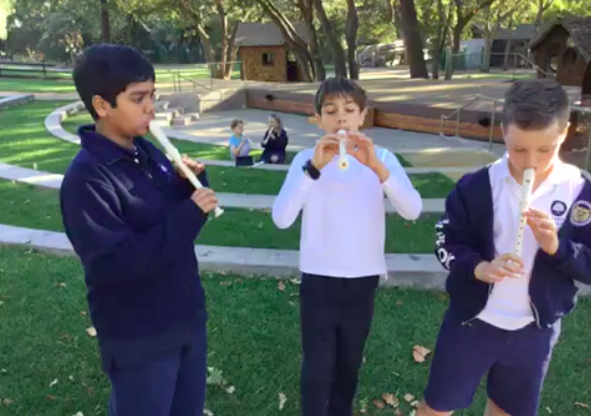 students playing a recorder, formative assessment captured in Sesame app